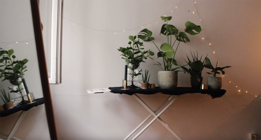 Wohnzimmer Pflanzen urban modern weiss lichterkette kreativ